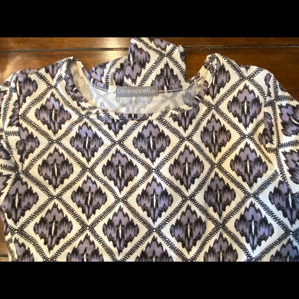Dress soft knit with Lycra flexibility. Size L